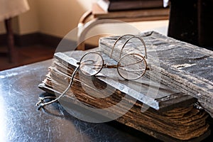 Ancient Treatise with very old glasses