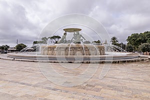 Ancient Tritons Fountain in the historic center of Valletta, Malta