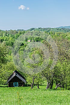 Ancient log house on a hill