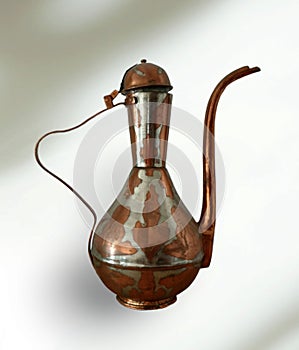 ancient unusual vessel for brewing tea with an ornament