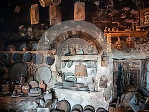 Ancient utensils on the ancient kitchen in the Megala Meteora monastery in Meteora region, Greece