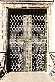 Ancient Venetian metal door.