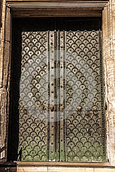 Ancient Venetian metal door.