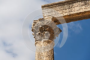 Ancient vertical columns with capitals and lintel photo