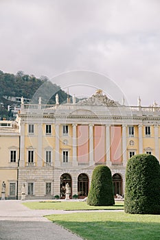 Ancient Villa Olmo with blank canvases on the facade in the garden. Lake Como, Italy photo