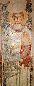 Ancient wall painting with Saint Stephen the Deacon in the Church of Saint Stephen, 13th century on Naxos Island, Cyclades