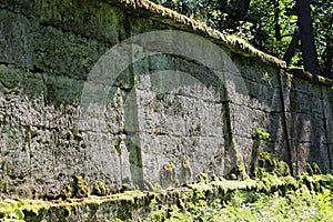 ancient wall that separates two parts of the park from each other. Eighteenth century. Stone and history