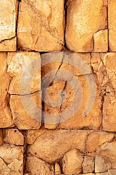 Ancient wall texture of cracked stone blocks