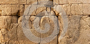 Ancient wall texture of large cracked stone blocks