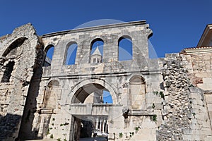 Ancient walls and bell tower of the Cathedral of Diocletian Palace in Split, Dalmatia, Croatia on a sunny summer day