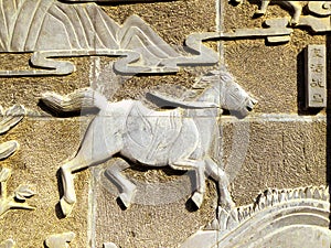 Ancient war horse stone caving photo