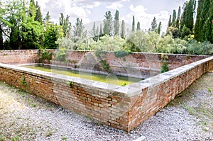 ancient water stock rainwater collection basin inside Monte Oliveto Maggiore complex