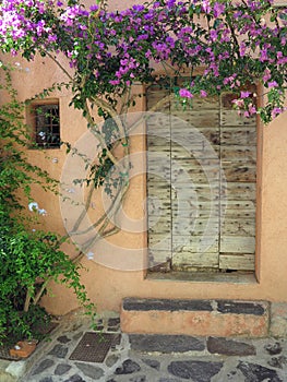 An ancient weathered stylish old wooden door