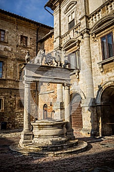 Ancient well on Piazza Grande square in Montepulciano, Tuscany