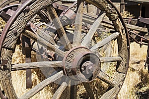 Ancient western wooden wagon wheel axle weathered