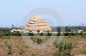 Ancient Western Xia tombs on a background of modern city, China