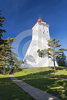 Ancient white lighthouse in Hiiumaa, Estonia photo