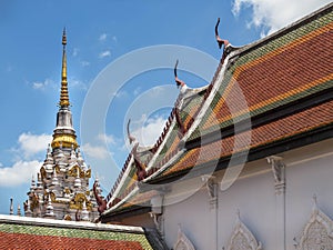 ancient white pagoda in Wat Phra Borommathat Chaiya Ratchaworawihan temple