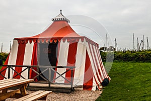 Ancient white-red tarpaulin tent in Muiderslot castle. Holland.