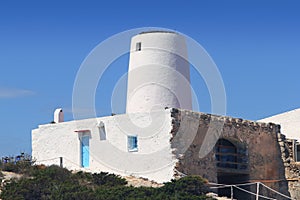 Ancient white salt windmill Formentera
