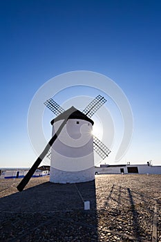 Ancient white windmill in Campo de Criptana, Spain