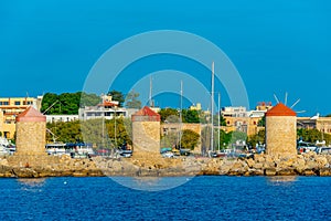 Ancient windmills at the port of Rhodes, Greece