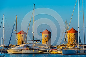 Ancient windmills at the port of Rhodes, Greece