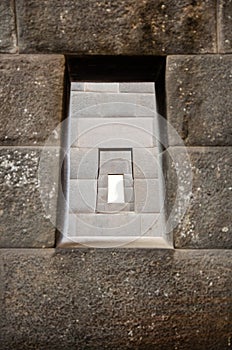 Ancient windows that connect the different rooms of the Inca temples at the Qorikancha Coricancha, Cusco, Peru