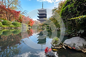 Ancient wood Toji temple of unesco world heritage site in autumn