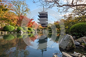 Ancient wood Toji temple of unesco world heritage site in autumn