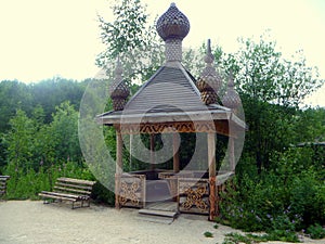 Ancient wooden alcove in an ethnographic park