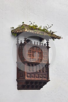 Ancient wooden balcon in Icod de Vines, Tenerife, Spain photo