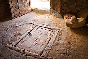 Ancient wooden closed trapdoor in a rustic house