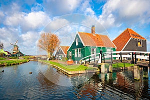 Ancient wooden Dutch houses along the waterside