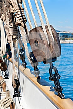 Ancient wooden sailboat pulley