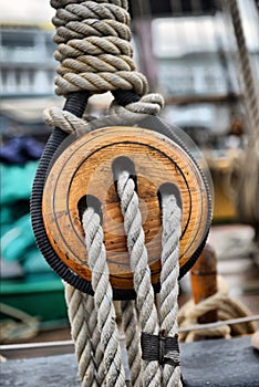 Ancient wooden sailboat pulleys photo