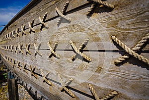 Ancient wooden shipwreck reconstruction detail on land, Urla, Izmir, Turkey. Ancient Greek culture, Kyklades ship