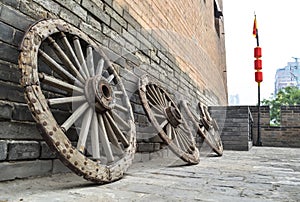 Ancient wooden wheels, standing in a row