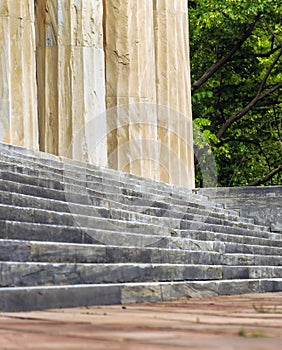 Ancient worn stone steps and columns of this ancient stone building