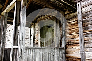 Anciet front door of a wooden cottage
