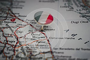 Ancona pinned on a map with the flag of Italy