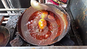 Anda Curry or Egg masala gravy is popular Indian spicy food or recipe. Special Making Anda Curry Masala Or Anda Lalbagh At Hotel