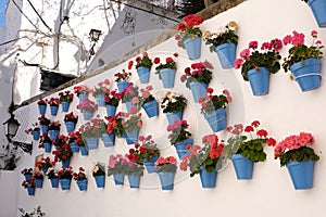 Andalucia Spain whitewashed village wall flower pot display
