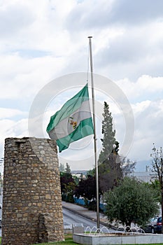 Andalusian flag at half-mast in memory of those killed by the coronavirus pandemic