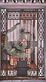 Andalusian Iron Door: Intricate Entryway with Artful Metalwork photo