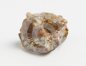 Ore andalusite on white background.