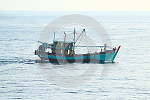 Andaman Sea   Myanmar - 03.20.2019: Myanmarese   Burmese fishing boat trawling in the Andaman Sea