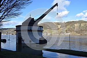 Andernach, Germany - 02 04 2021: ancient Roman crane ' Alter Kahnen ' in the Rhine flood