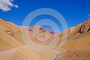 Andes landscape and the road leading to Paso De Agua Negra mountain pass, Region de Coquimbo, Chile to Argentina