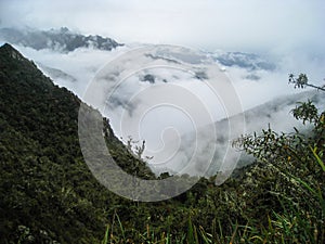 The Andes mountains and low clouds from the Inca Trail. Peru.